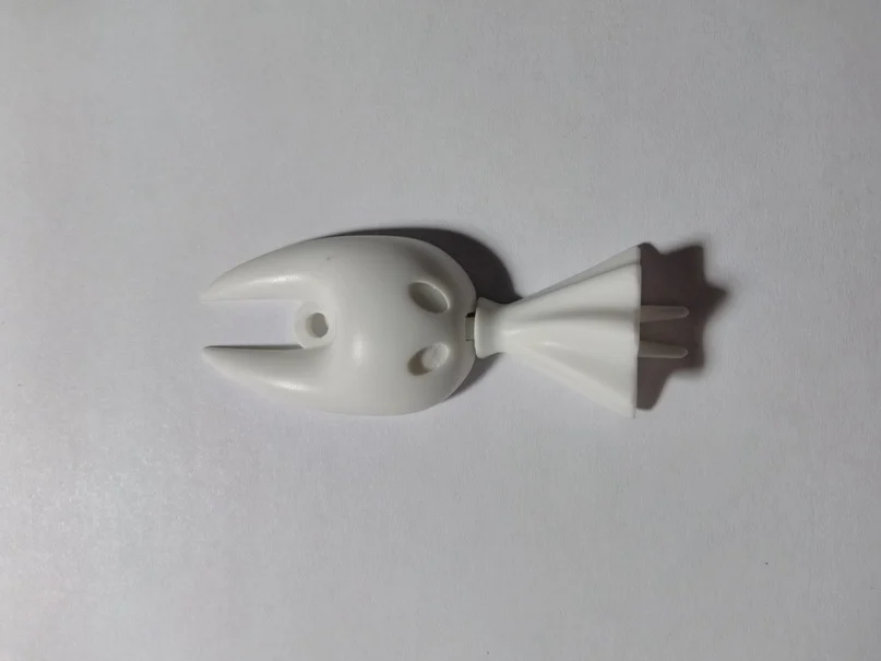 Изображение — Кулон Хорнета из игры Hollow Knight.
